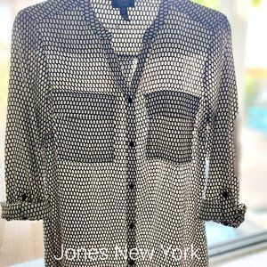 Black and white patterned button up V neck shirt